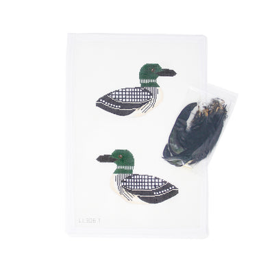 Hand-painted needlepoint canvas of a black and green double sided loon, feathers are included for unique finishing -- perfect for the spring or summer stitching 