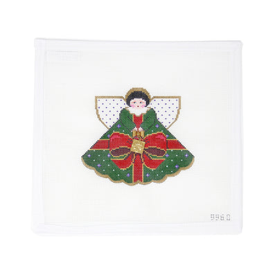 Hand-painted needlepoint canvas by Debbie Woodard Designs featuring a festive angel on 18 mesh, wearing a green skirt wrapped in a red bow like a Christmas present. A charming holiday design perfect for finishing as an ornament, framed decoration, or a whimsical addition to your seasonal needlepoint collection.