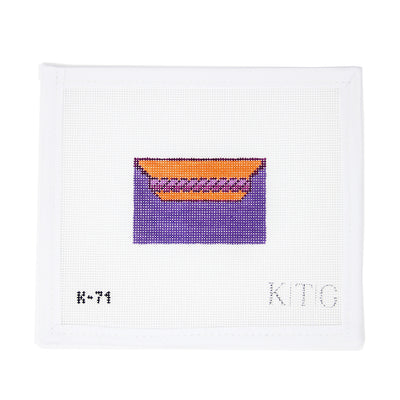 Hand-painted 18 mesh needlepoint canvas featuring a micro hunting bag in a purple and orange color, inspired by luxury equestrian style. Designed for finishing as a mini clutch, ornament, or stylish accessory, this petite canvas offers a refined, fashion-forward stitching project.