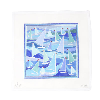 Hand-painted needlepoint canvas on 13 mesh, 10" square, featuring an allover pattern of blue and green sailboats. A fresh and nautical design perfect for finishing as a decorative pillow, framed coastal accent, or summery tray insert—great for beach lovers and sailing enthusiasts.