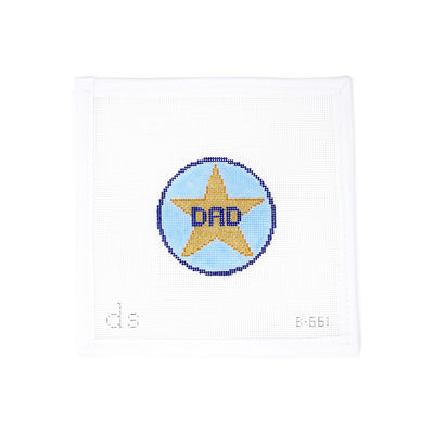 Hand-painted needlepoint canvas by Doolittle Stitchery on 18 mesh, featuring a 3" blue round with a star in the center and the word “Dad.” Perfect for Father's Day, this sweet design can be stitched with metallic thread for added sparkle and finished as a special ornament, gift tag, or mini framed piece to celebrate dad.