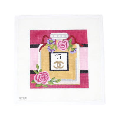Chanel Number 5 Perfume Bottle needlepoint canvas designed by Alice Peterson, featuring a classic Chanel bottle adorned with flowers on a pink background. Printed on 13-count mesh, perfect for creating framed art, pillows, or a decorative accessory. Add beads or embroidery for extra detail and texture. Mesh size: 13-count, 9x9 inches