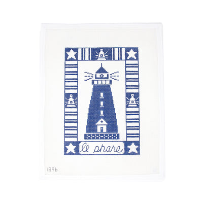 Le Phare needlepoint canvas designed by Alice Peterson, featuring a detailed blue and white lighthouse design. Printed on 13-count mesh, perfect for creating framed art, pillows, or a decorative wall hanging. Mesh size: 13-count.