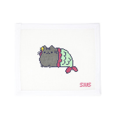 Whimsical needlepoint canvas featuring a playful Pusheen-style cat with a rainbow-striped tail on 18 mesh. This charming and colorful design adds a fun, magical touch to any project. Perfect for finishing as a small pillow, zippered pouch, or framed for a cheerful pop of personality in a child’s room or craft corner.