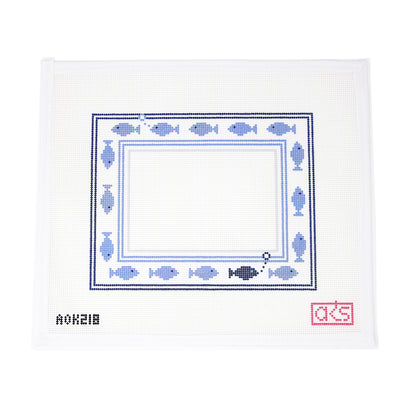 Hand-painted needlepoint canvas on 13 mesh featuring colorful fish lining the edges of a rectangular picture frame design. A whimsical and beachy piece perfect for finishing as a custom stitched photo frame, coastal décor, or nautical-themed tray insert.