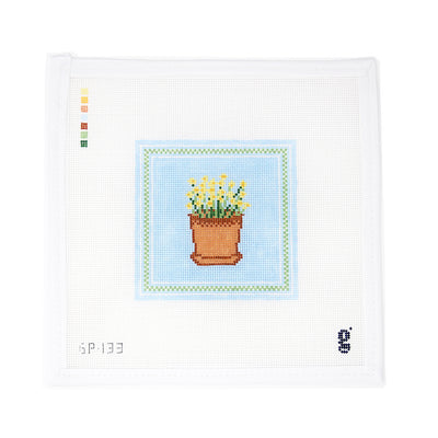 Goodpoint Needlepoint canvas featuring daffodils in a pot on a blue background with a green border. Perfect for creating a small framed piece, ornament, or pillow. Printed on 18-count mesh. Mesh size: 18-count, 4x4 inches