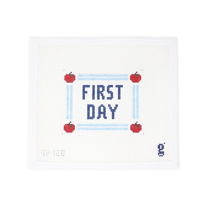 First Day Needlepoint canvas by Goodpoint Needlepoint, featuring the words 'First Day' with apples in the corners, perfect for a kids' room sign or pillow. Printed on 13-count mesh. Mesh size: 13-count, rectangle.