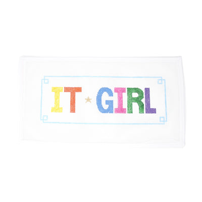 Hand-painted needlepoint canvas of an 'IT Girl' sign on 13 mesh, perfect for finishing as a trendy pillow or chic framed decor.