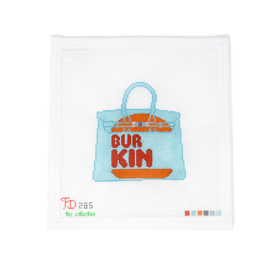 Blue Birkin bag needlepoint canvas featuring a playful twist on the Burger King logo—reimagined to say “Bur Kin.” A clever play on words that merges luxury fashion with pop culture humor. This 18 mesh canvas is perfect for finishing as a framed art piece, zip pouch, or cheeky patch to personalize a tote.