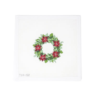 Hand-painted 18 mesh round needlepoint canvas featuring a classic green holiday wreath adorned with bright red poinsettias. Custom-designed by Vallerie Needlepoint Designs and perfect for finishing as a festive ornament. A timeless Christmas piece ideal for seasonal stitching and holiday decor.