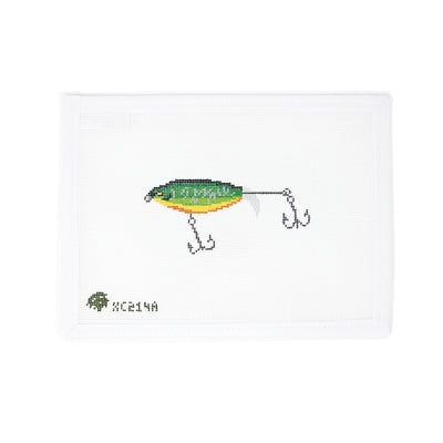 Hand-painted needlepoint canvas featuring a green rattle trap fishing lure on 18 mesh. A unique design perfect for finishing as an ornament, gift tag for an angler, or framed décor for a lake house, cabin, or tackle-themed space.
