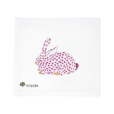 Hand-painted needlepoint canvas of a pink Herend-style bunny on 18 mesh, showcasing the classic fishnet pattern. Perfect for finishing as a sweet Easter ornament, baby girl nursery décor, or a delicate springtime tray or framed accent.