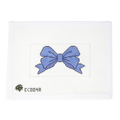 Hand-painted needlepoint canvas featuring a classic blue bow on a rectangular background, 13 mesh. This elegant and versatile design is perfect for finishing as a clutch insert, zip pouch, or framed as a sweet, feminine accent piece.