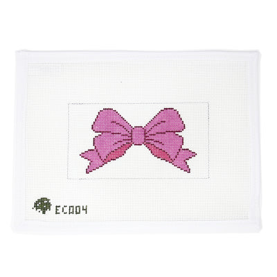 Hand-painted needlepoint canvas featuring a classic pink bow on a rectangular background, 13 mesh. This elegant and versatile design is perfect for finishing as a clutch insert, zip pouch, or framed as a sweet, feminine accent piece.