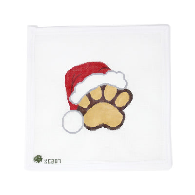 Round needlepoint canvas titled “Merry Pawmas,” featuring a festive paw print wearing a red Christmas hat, hand-painted on 18 mesh. Perfect for finishing as a holiday ornament, pet-themed gift tag, or framed decoration for animal lovers celebrating the season