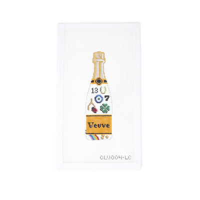 
"Whimsical 18 mesh needlepoint canvas titled 'C'ate La Vie' featuring a Veuve Clicquot-style champagne bottle bursting with colorful lucky symbols and charms—think horseshoes, four-leaf clovers, evil eyes, dice, and more. A playful and chic design perfect for finishing as a celebration tray, bar cart accent, or framed piece for a touch of bubbly luck.