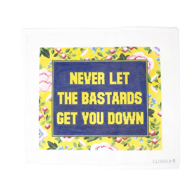 Large needlepoint canvas featuring the empowering phrase 'Never Let the Bastards Bring You Down' in bold lettering, stitched on 13-count mesh. A striking design perfect for finishing as a statement pillow, wall hanging, or framed art with attitude.